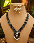 Kundan stone and purple beads necklace with earrings
